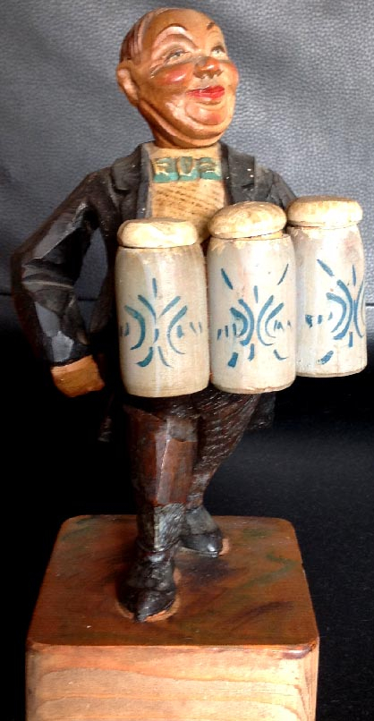 vintage large carved corkscrew of a man carrying German steins